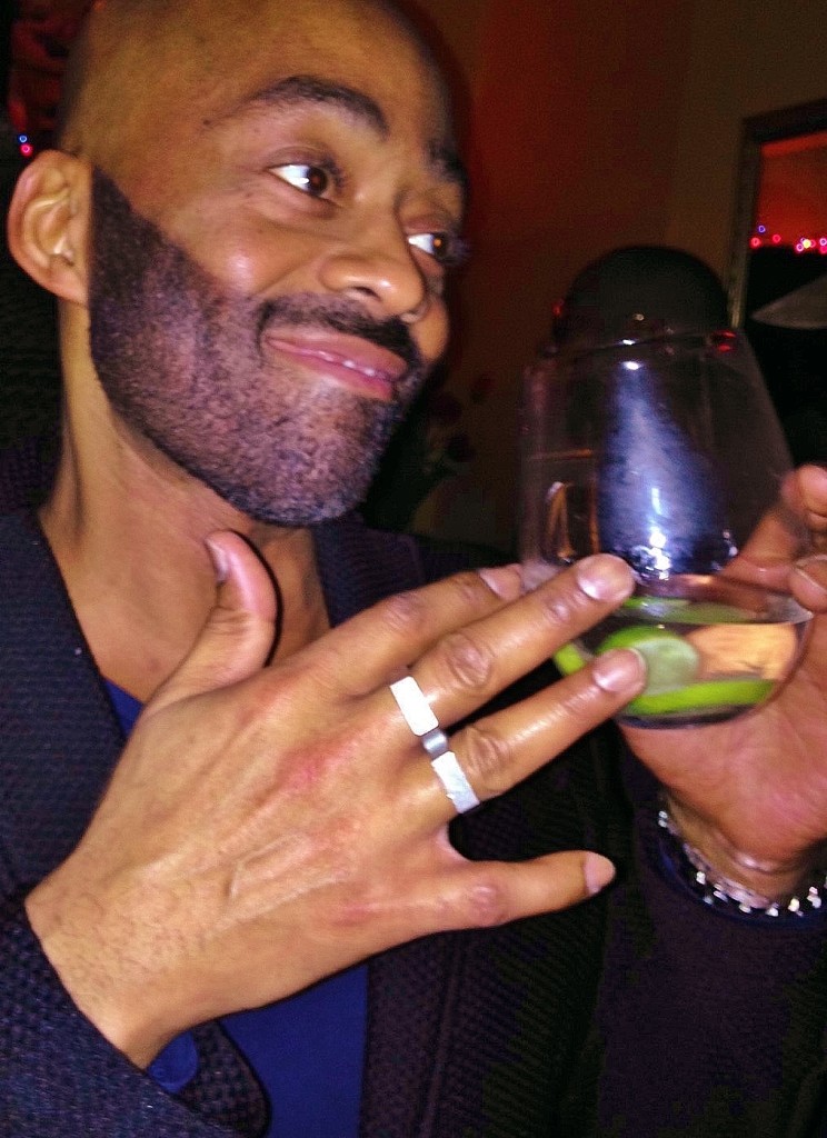 Marlon pairs the perfect holiday cocktail with the perfect double-fingered, reversible ring by Danny Fox.